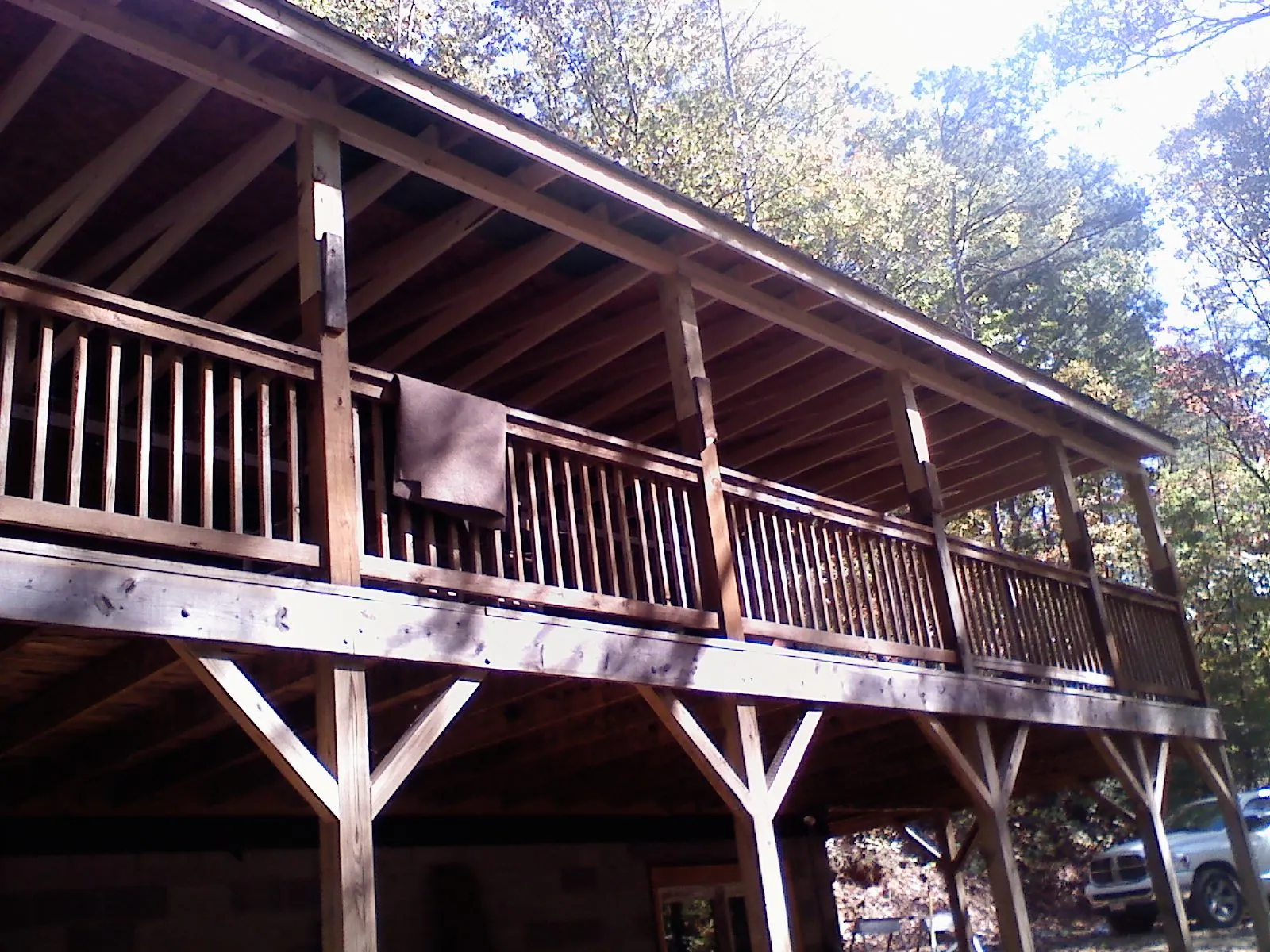 Timber framing under a new elevated porch and deck — Roof Leak Repair in Joy by Roofing Brothers